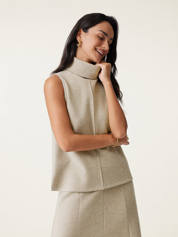 Maison Delcourt ™ | Pull à col roulé avec ourlet fendu