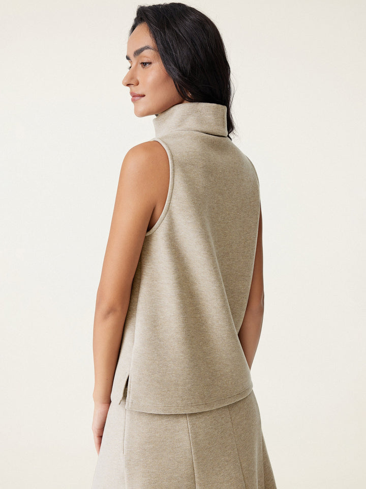 Maison Delcourt ™ | Pull à col roulé avec ourlet fendu