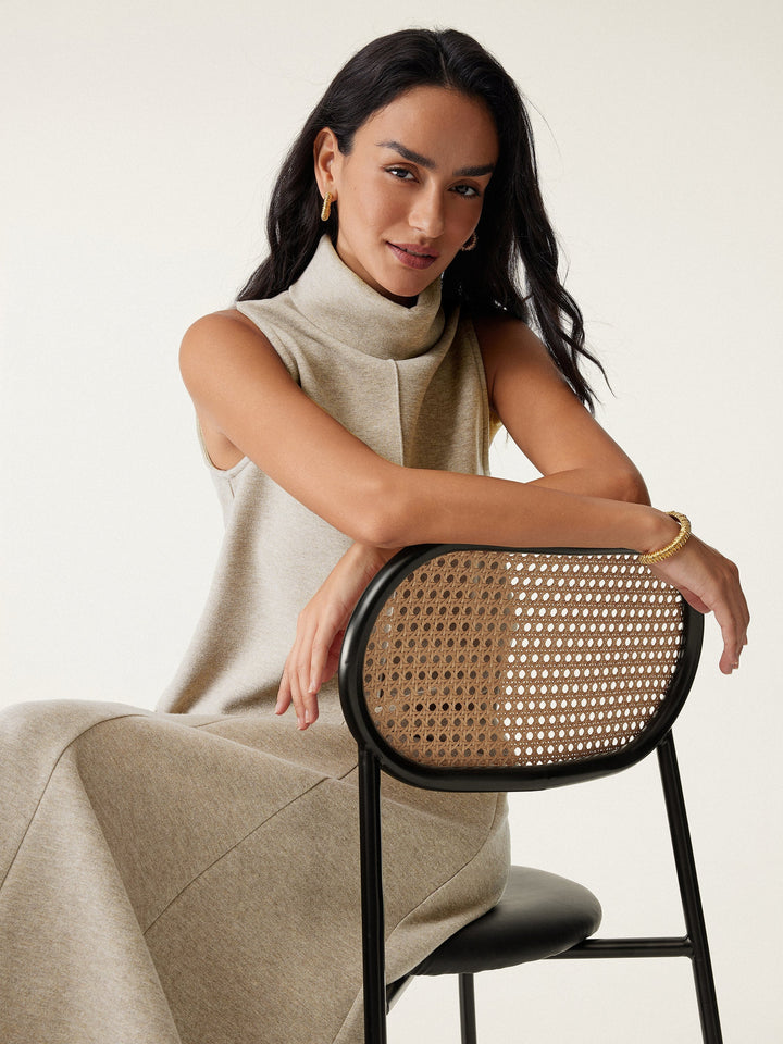 Maison Delcourt ™ | Pull à col roulé avec ourlet fendu