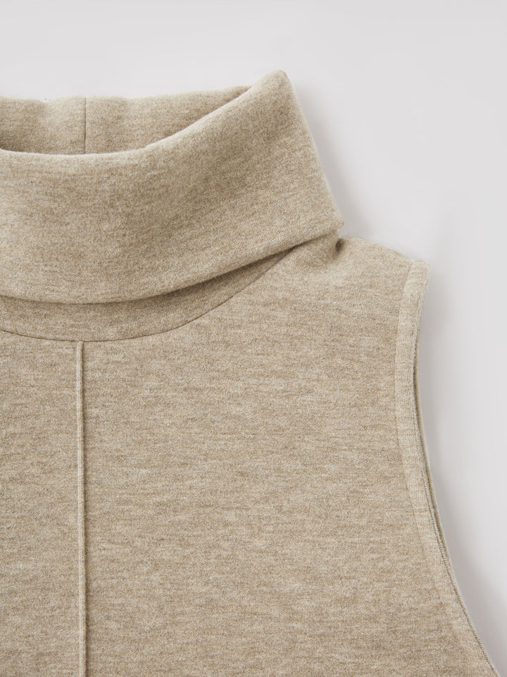 Maison Delcourt ™ | Pull à col roulé avec ourlet fendu